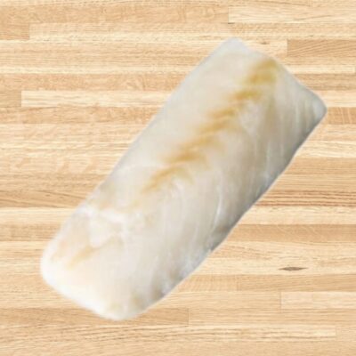 Fresh cod fillet on wooden background.